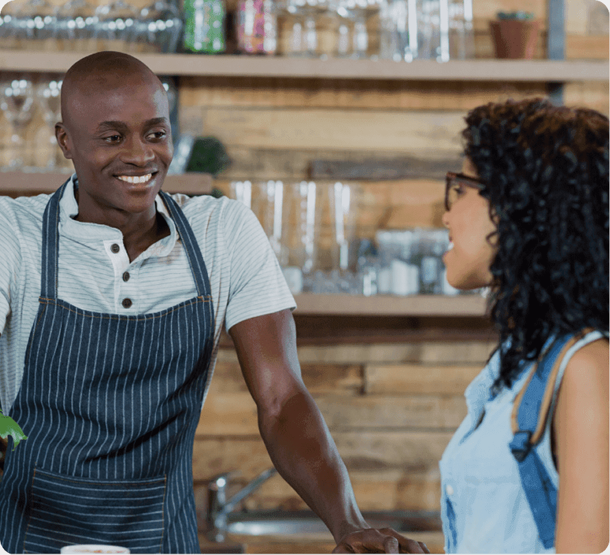 Cook talking with a customer